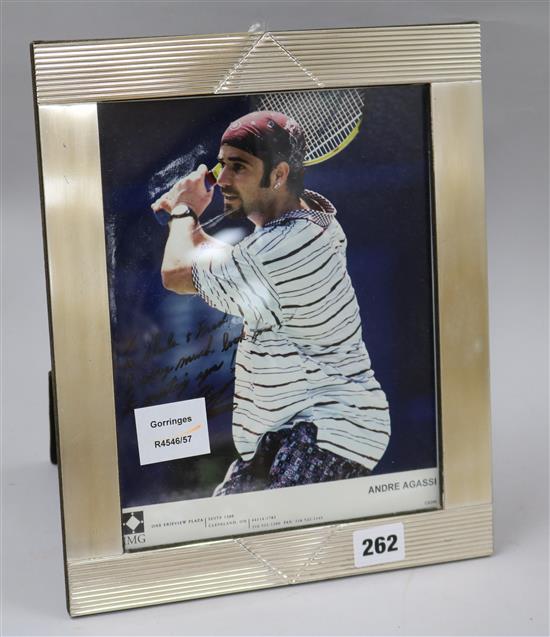 A signed photo of Andre Agassi 24 x 18.5cm.